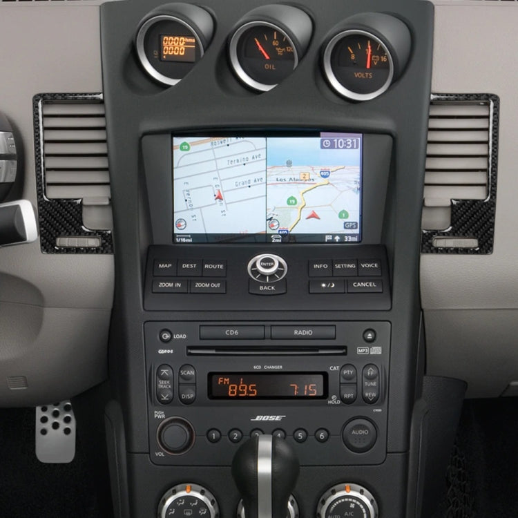 Black carbon fiber vent trim stickers on a car center dashboard console