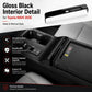 Toyota RAV4 armrest box trim strip in glossy black, installed on center console area