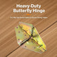 Butterfly-shaped folding metal hinge with central spring and mounting holes on metal plate, gold tone.