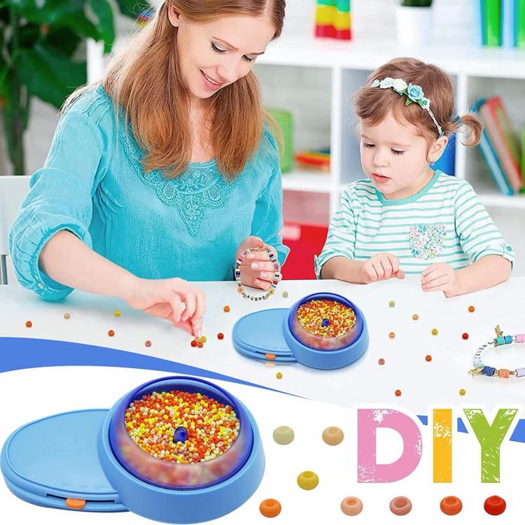 Electric bead spinner machine with blue base and rotating clear bead bowl