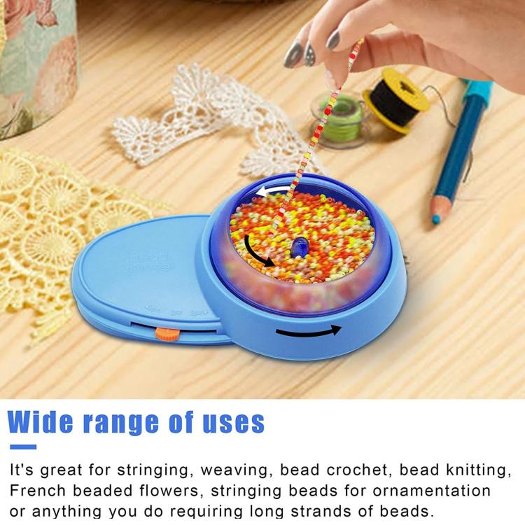 Blue electric bead spinner on wood surface with bead-filled clear bowl