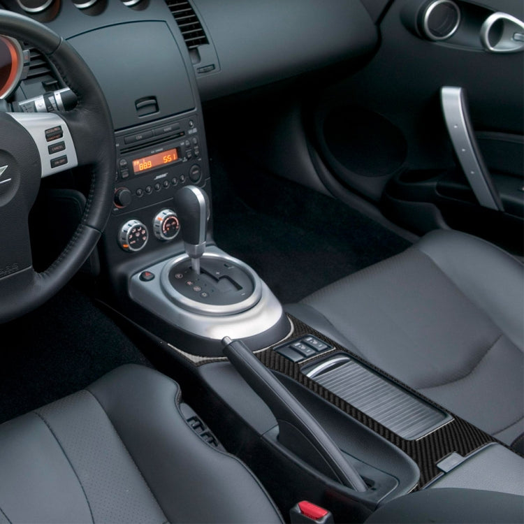 Carbon fiber central console trim sticker installed on dashboard panel