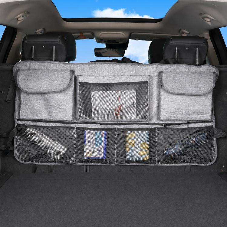 Gray car trunk organizer with mesh center panel and two side flap pockets