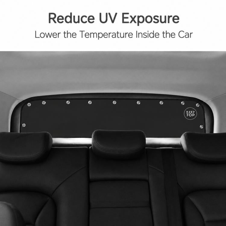 Installed black rear car window sunshade curtain with suction cups across the top