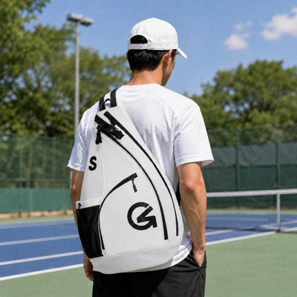 Color-block sports crossbody bag in white with black panels and zipper pockets