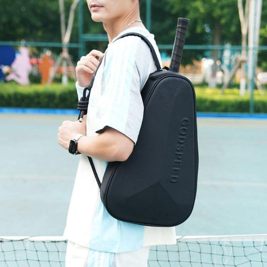 Black hard-shell padel racket sports bag worn on shoulder with adjustable strap