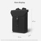 Black rectangular backpack with fold-over top flap and adjustable shoulder straps