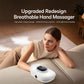 White hand massager positioned near a person’s hand on a couch