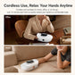 White cordless airbag hand massager shown in office and home settings