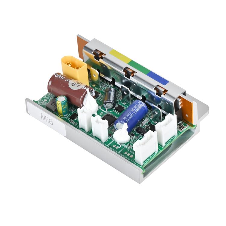 Electric scooter motor controller PCB angled view with terminal headers and capacitors