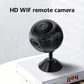 Dark mini WiFi security camera with round lens and tabletop stand