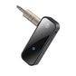 Compact black Bluetooth AUX receiver with 3.5mm headphone-style plug and power icons