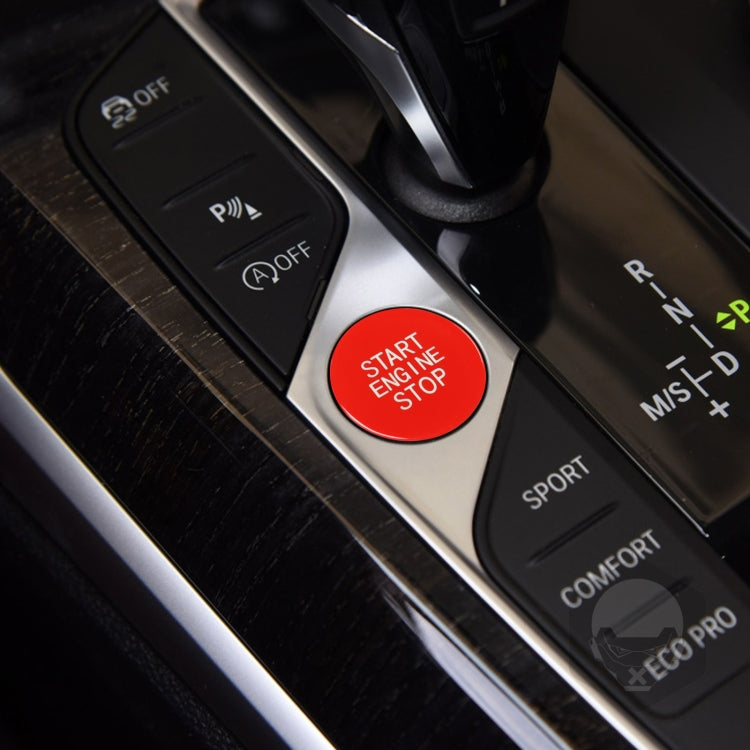 Car engine start/stop push button in red with START ENGINE STOP text