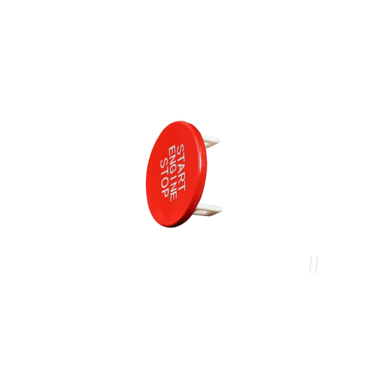 Red engine start/stop push button with two metal prongs on the back