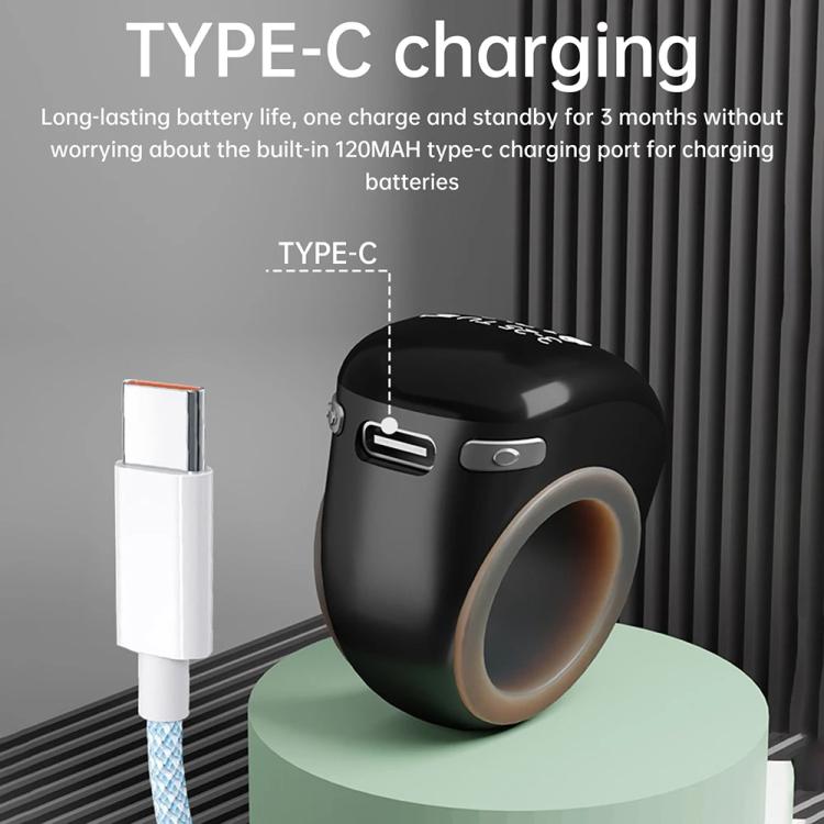 Black smart prayer ring counter with Type-C charging cable connected