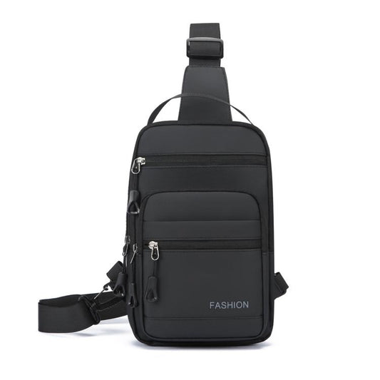 Black crossbody chest bag with top handle strap, front zip pocket, and adjustable webbing strap
