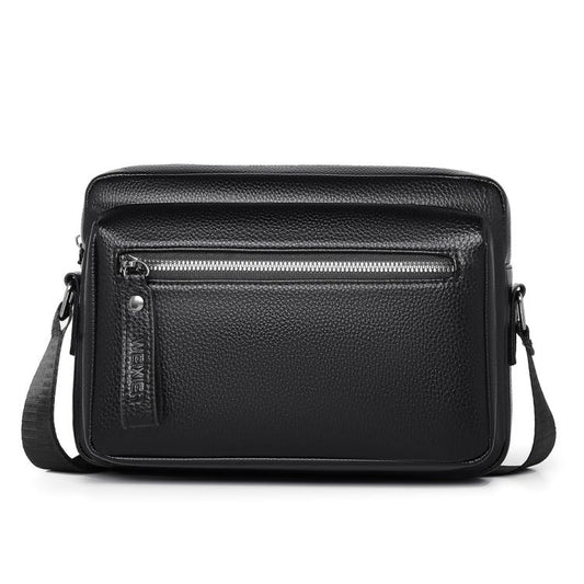 Black lychee-textured waterproof shoulder crossbody bag with zipper front and side pocket.