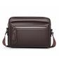 Brown lychee-textured waterproof shoulder crossbody bag with top zipper and side strap.