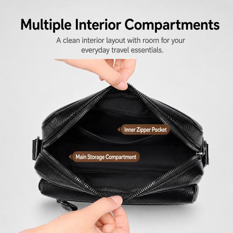 Black crossbody bag open to show main compartment with inner zipper pocket.