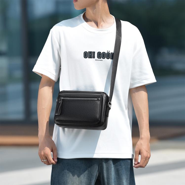Black retro lychee-texture waterproof crossbody bag with adjustable strap and zip front pocket