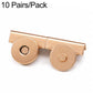 Gold-tone magnetic bag clasp set: two round metal snap halves with attachment tabs