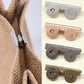 Magnetic bag clasp set shown in multiple colors with metal tabs for fastening