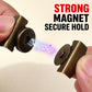 Bronze magnetic bag clasp held in hands, showing two interlocking snap halves