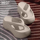 Oatmeal/cream EVA thick-soled flip-flops with wide crisscross strap and raised platform.