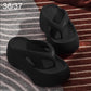 Black EVA thick-soled flip-flops with wide crisscross strap and molded platform sole.