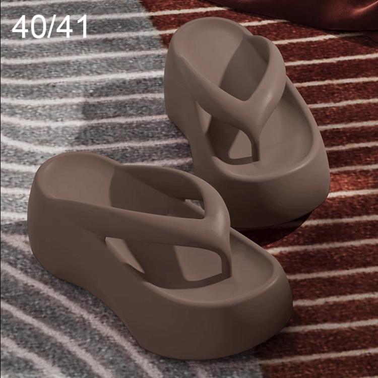 Thick-soled EVA flip-flops in light brown, molded thong straps and high platform sole