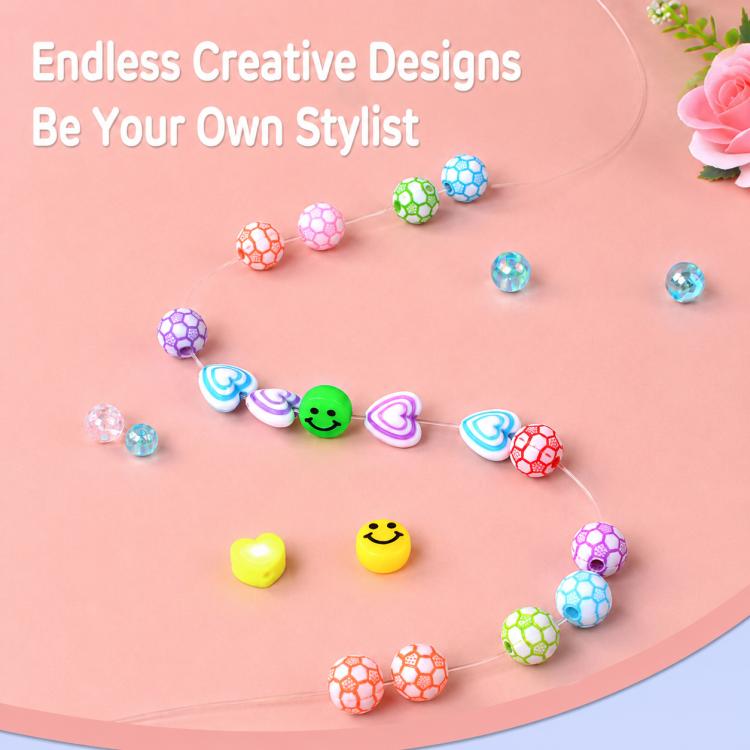 DIY beaded bracelet kit with loose heart, planet, and flower bead charms