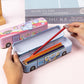 Blue and pink cartoon bus pencil boxes with lids open, pencils inside the tray