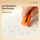 Orange hexagonal pencil eraser held in fingers, erasing on graph paper