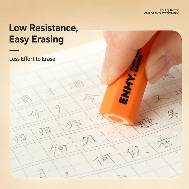 Orange hexagonal pencil eraser held in fingers, erasing on graph paper