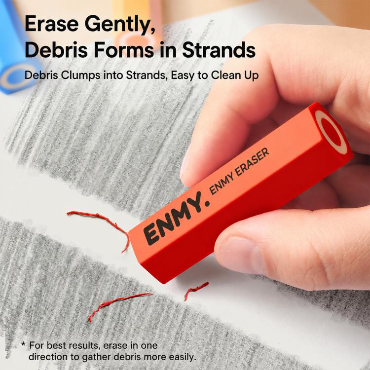 Red hexagonal pencil-shaped eraser removing debris from pencil marks