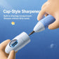Hand holding blue cap-style pencil sharpener
