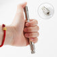 Spark plug thread repair tool held in hand, showing knurled head and threaded shaft