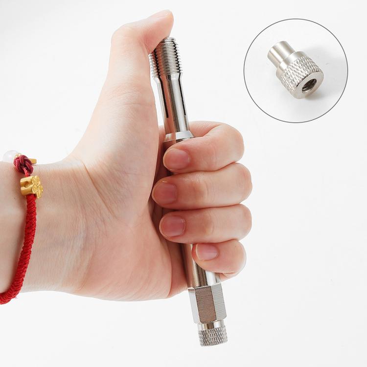Spark plug thread repair tool held in hand, showing knurled head and threaded shaft