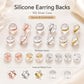Silicone earring backs assortment with clear caps and mixed metal cores in gold and silver