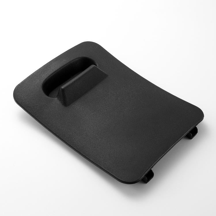Engine access panel, dark textured plastic with recessed handle slot