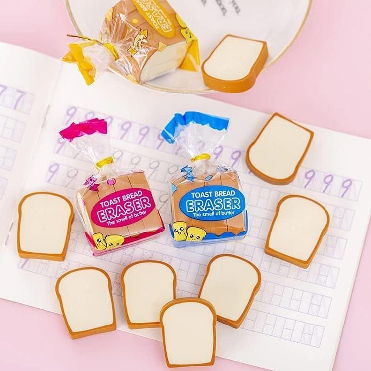 Toast bread eraser set with blue and orange wrapped packs and white bread slice erasers.