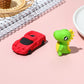 3D car and dinosaur erasers: red car and green dinosaur character