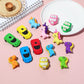 3D cartoon eraser 5-pack with car and dinosaur shapes on tray