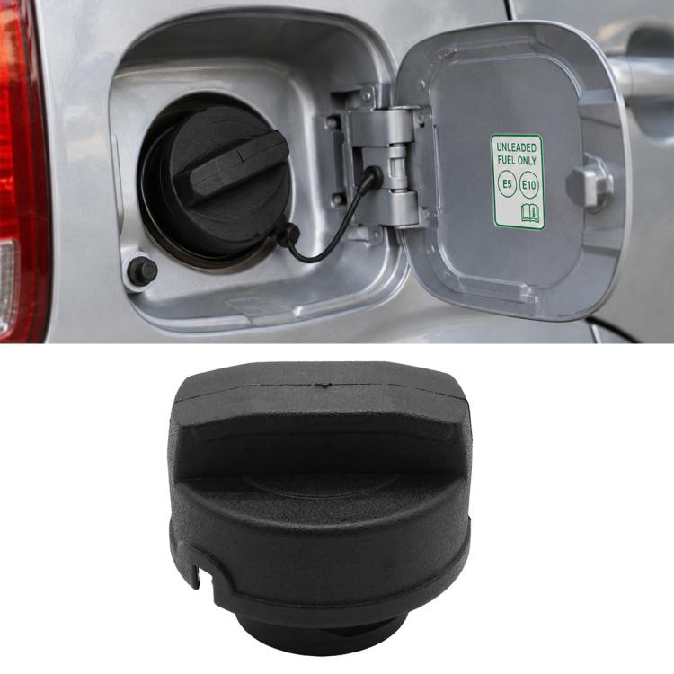 Fuel tank cap with tethered cover, installed on car fuel filler