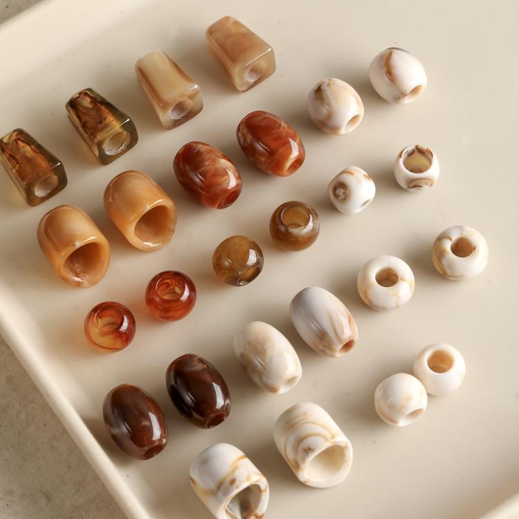 Large-hole acrylic beads, marbled amber and white mix, assorted barrel and round shapes