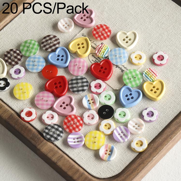 Mixed resin buttons in various shapes and colors, including hearts and plaids
