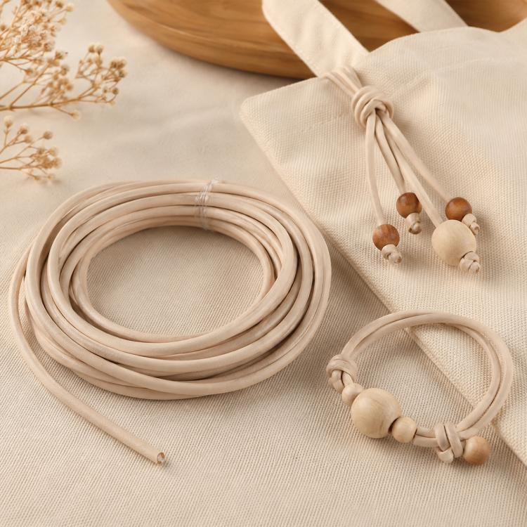 Light beige PU leather beading cord rolls with knotted bracelet and wooden bead accents