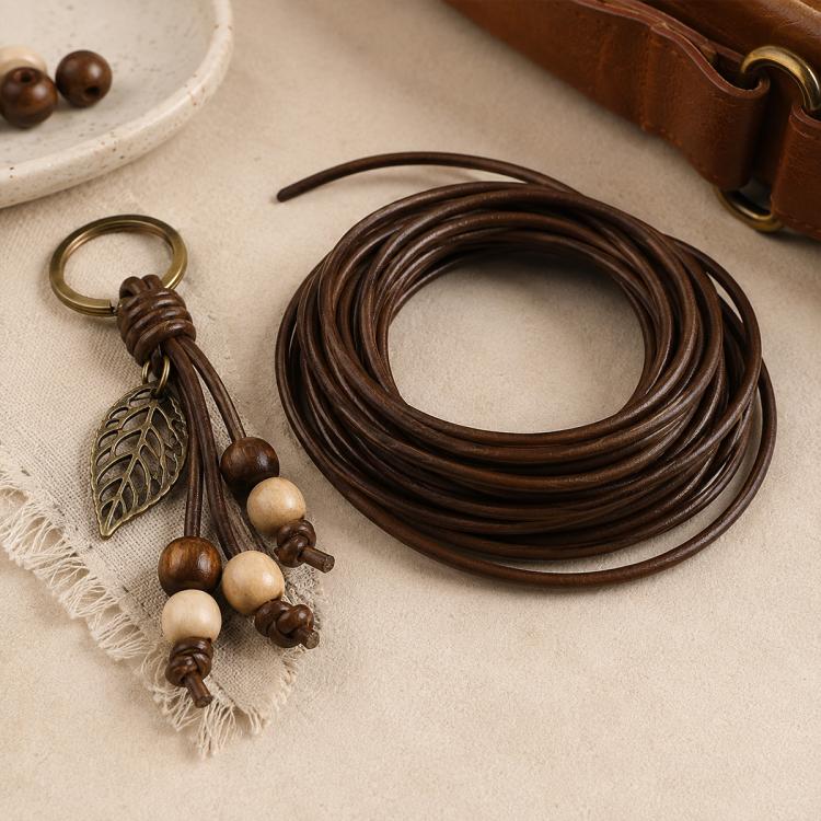 Dark brown PU leather beading cord with leaf charm keychain and wooden bead details