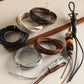 3mm PU leather beading wires in assorted coils: silver, black, white, and brown tones