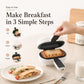 Mini sandwich maker with open lid and cooked sandwich, handled for serving